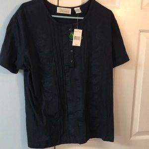 Nice short sleeved knit embroidered blue top. 1 X